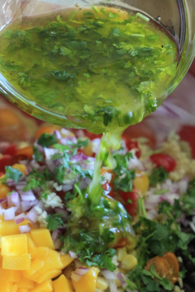 6. Pour the lemon-cilantro dressing over the top and toss to combine. Cover and refrigerate for at least one hour to allow the flavors to meld. It tastes even better at lunch the next day.